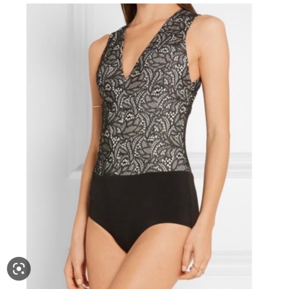 Alice $ Olivia black lace plunging neckline bodysuit. Size XS.